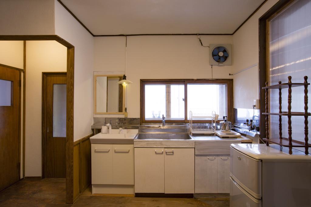 Guest House Sato Shoten Toyoura Экстерьер фото